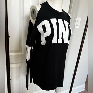 Open shoulder pink shirt